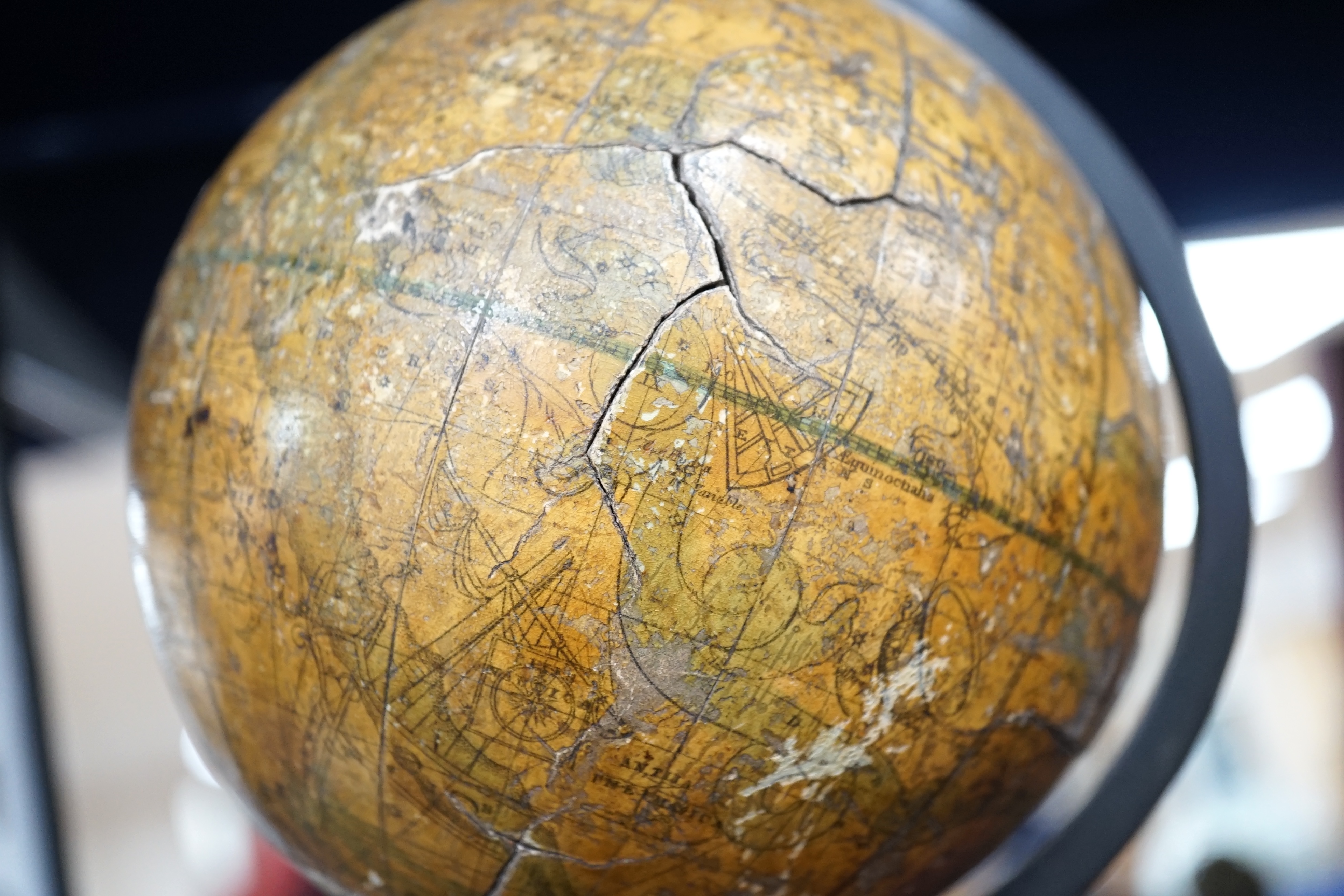 A 19th century 4.5 inch celestial globe on mahogany stand, with distinct maker’s mark reading; ‘Bales? New Celestial Globe 1846’, diameter 11cm. Condition poor, significant damage to the surface and missing sections of p